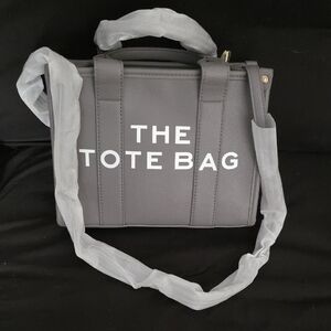 Gray LeatherTote Bag with White Text